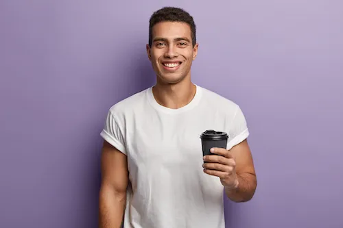 Man holding a cup of coffee